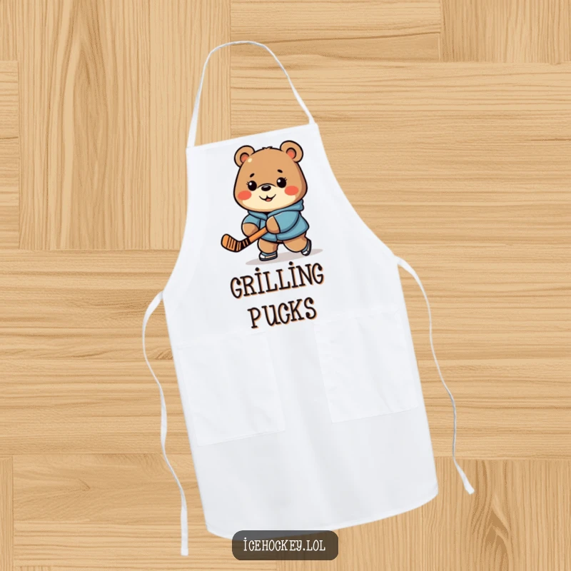 Funny apron with a cheerful bear, determinedly stick-handling a hockey puck, perfect for kitchen play.