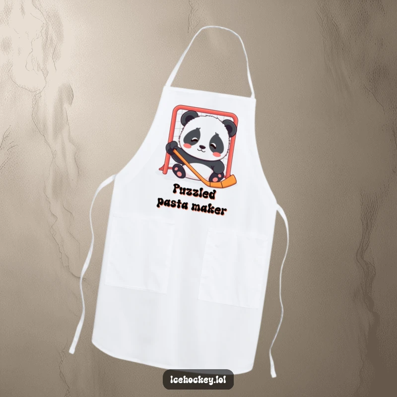 Funny apron with a contented panda cub looking confused by a hockey net, adding a touch of cute perplexity to the kitchen.