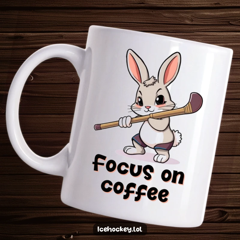Funny mug featuring a determined rabbit intensely aiming a hockey stick, eyes focused on the puck.