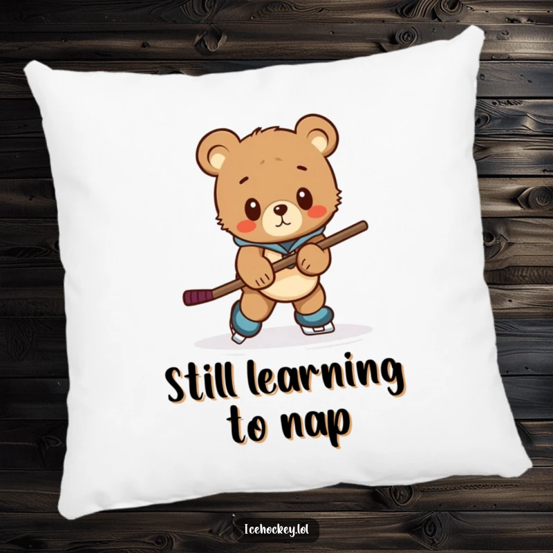 Funny pillow featuring a curious bear cub hilariously attempting to skate with an oversized hockey stick, perfect for decor.