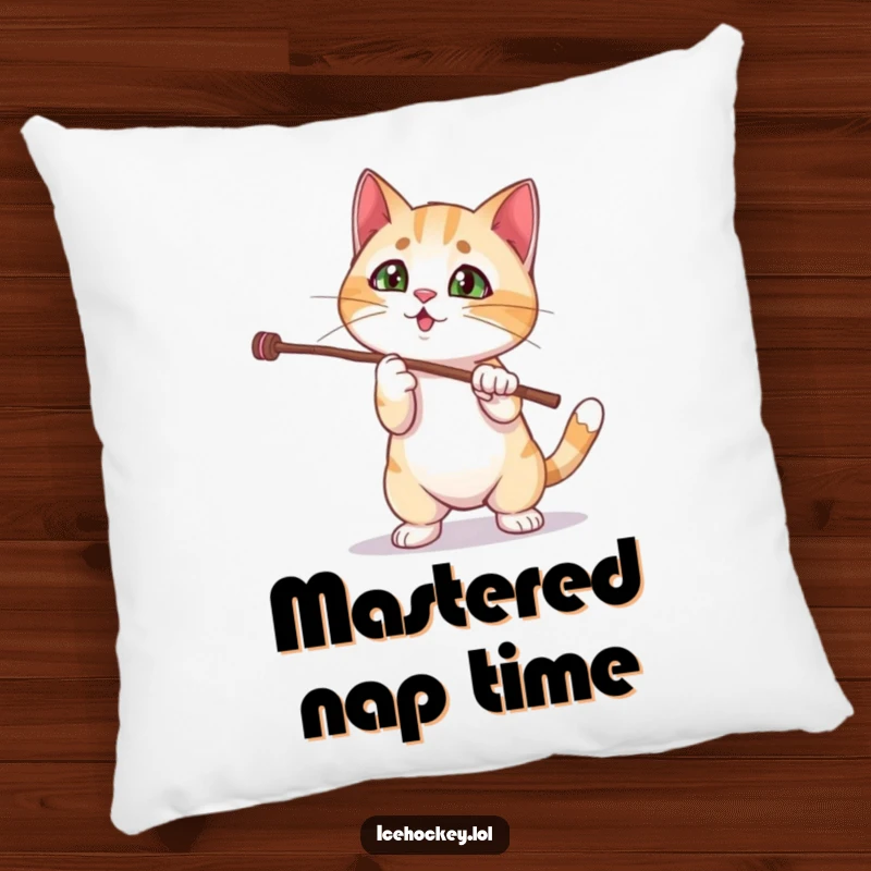 Funny cat pillow with a curious kitten hilariously failing at a magic stick trick, offering comfort and amusement.
