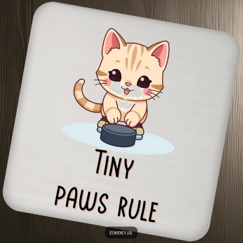 Funny drink coaster with an alert kitten in skates, stopping a hockey puck, bringing cute humor to tabletops.