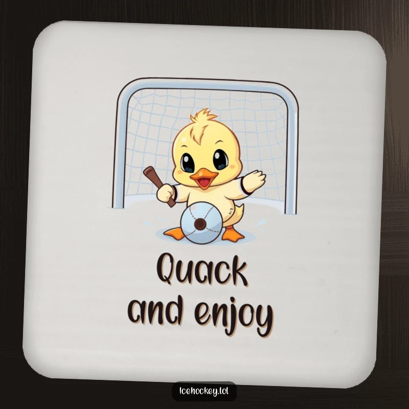 Funny drink coaster with a determined little duck making a wide-eyed goalie save, offering humorous protection for surfaces.