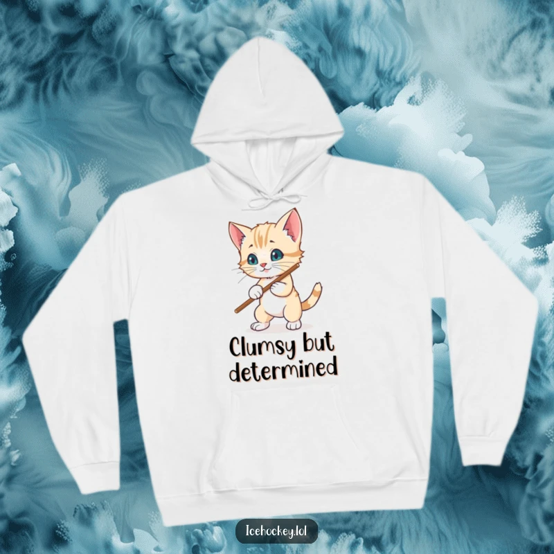 Funny hoodie: A determined but wobbly kitten tries its best to block a hockey puck with a stick, looking utterly charming.