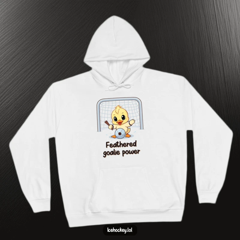 Funny hoodie depicting a small duck with wide eyes making a valiant goalie save attempt, full of humorous determination.
