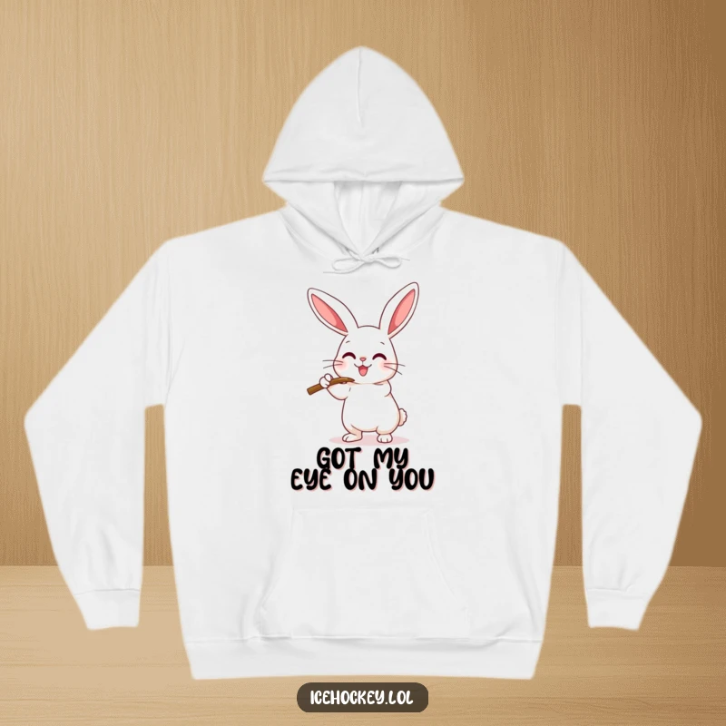 Funny Hoodie featuring a happy rabbit executing a playful hockey check with its stick, designed for comfort and humor.