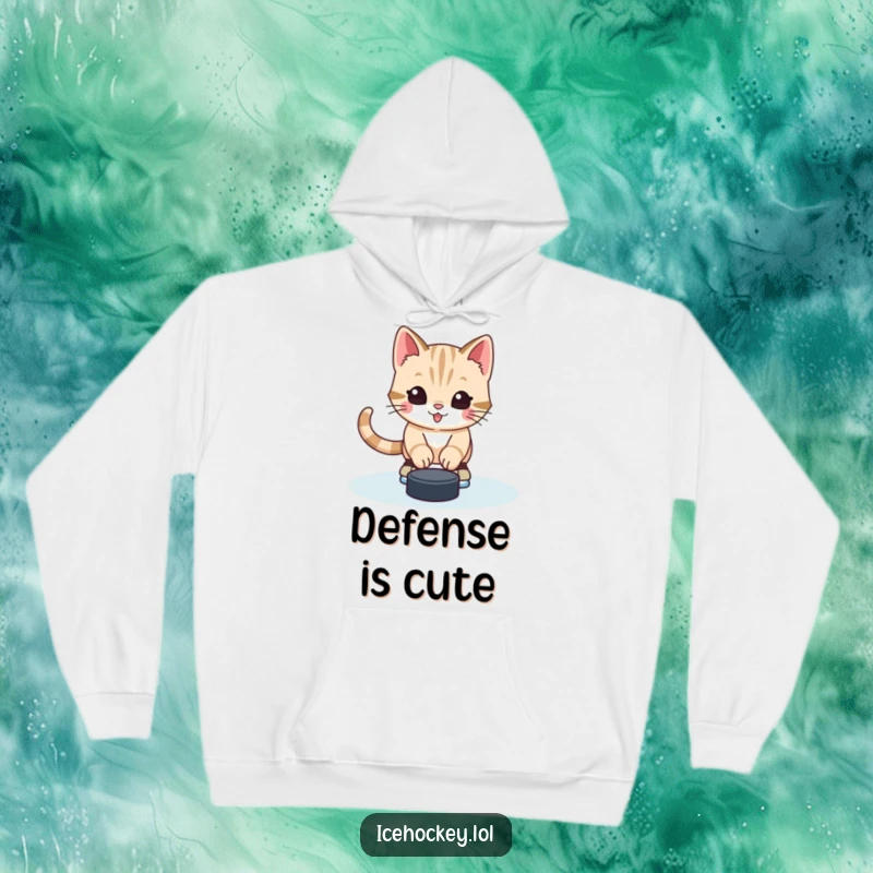 Funny hoodie showcasing an alert, happy kitten wearing skates and blocking a hockey puck with adorable goalie skills.