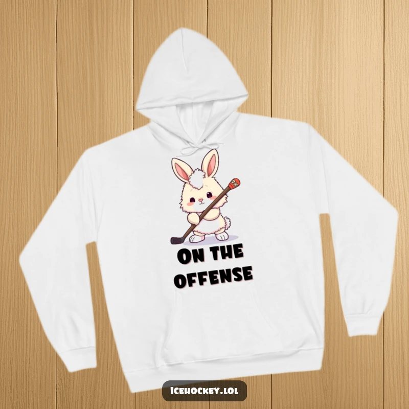 Funny bunny hoodie: a determined fluffy bunny holding a hockey stick, looking ready to play, bringing a mix of cute and competitive spirit.