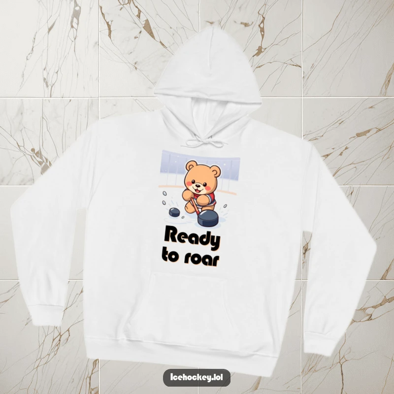 Funny Hoodie featuring a determined bear powerfully shooting a hockey puck, with a dynamic pose and a focus on action.