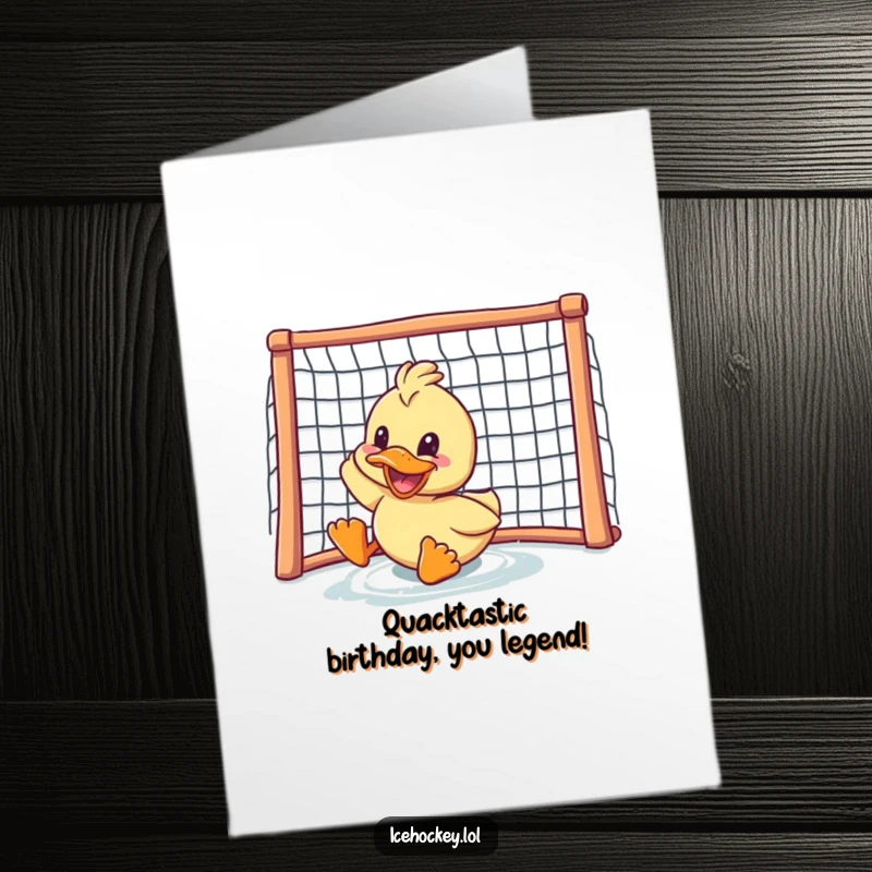 Funny Free Printable Birthday Card: A delighted duck grins widely as it slides towards the net, celebrating a goal with glee.