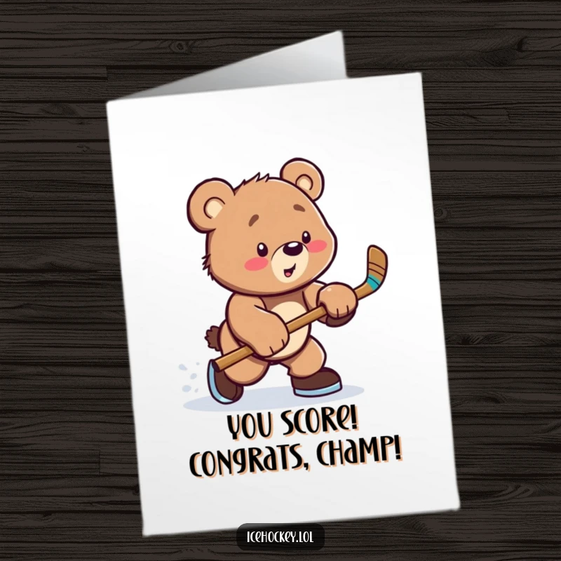Funny Free Printable Congrats Card: Adorable bear cub in hockey gear celebrating a win with a slap shot, perfect for congratulations.