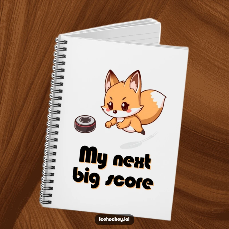Funny notebook featuring a playful fox skating at high speed, comically chasing a hockey puck, perfect for note-taking.
