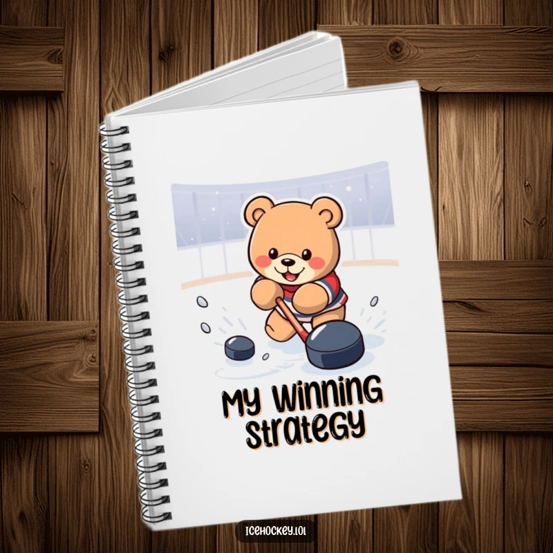 Funny Notebook with a determined bear powerfully shooting a hockey puck, ideal for jotting down strategies and ideas.