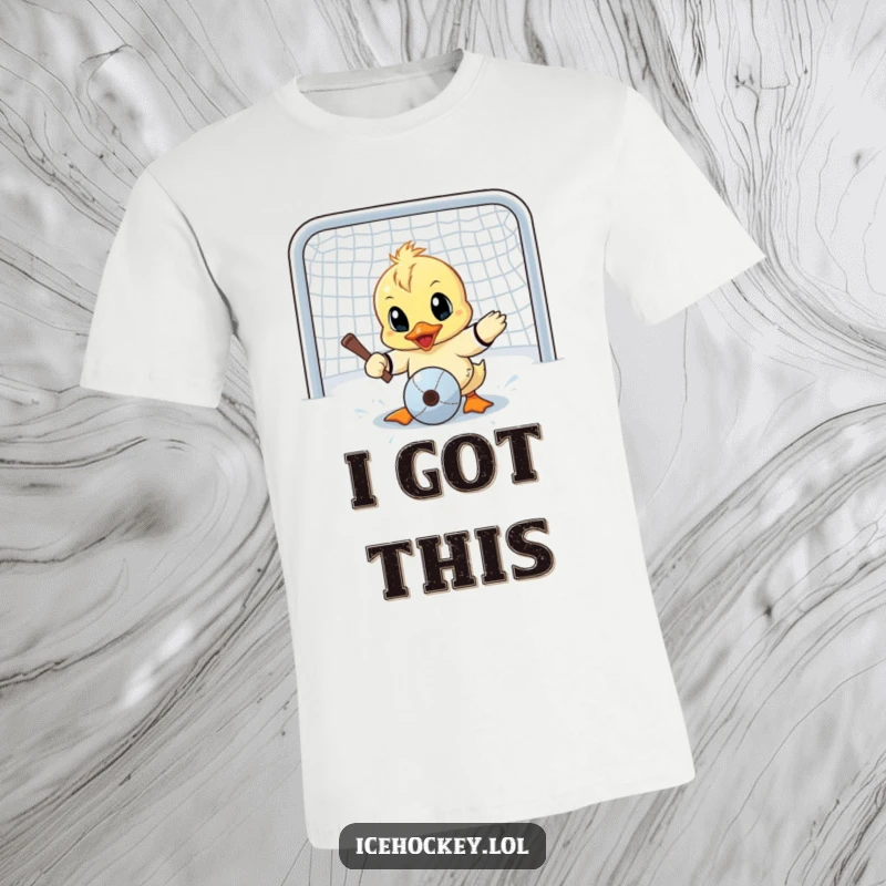 Funny t-shirt showcasing a determined little duck attempting a goalie save, eyes comically wide with intense focus.