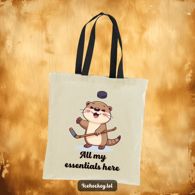 Funny tote bag depicting a happy otter skillfully juggling a hockey puck, a unique and humorous accessory.
