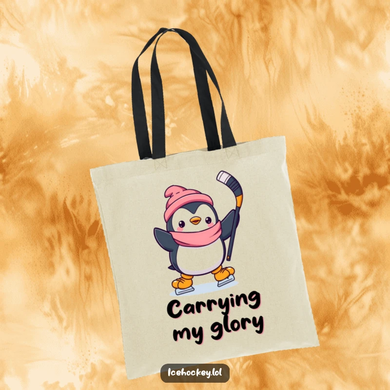 Funny tote bag featuring a happy penguin skating with a hockey stick held triumphantly high, ready for any task.