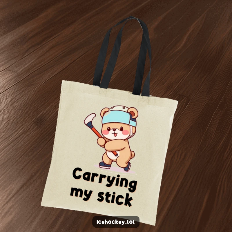Funny Bear Tote Bag: A durable tote showing a cheerful bear wearing a hockey helmet and ready to swing a stick.
