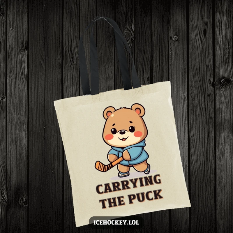 Funny tote bag showcasing a determined bear stick-handling a hockey puck, ready for any outing.