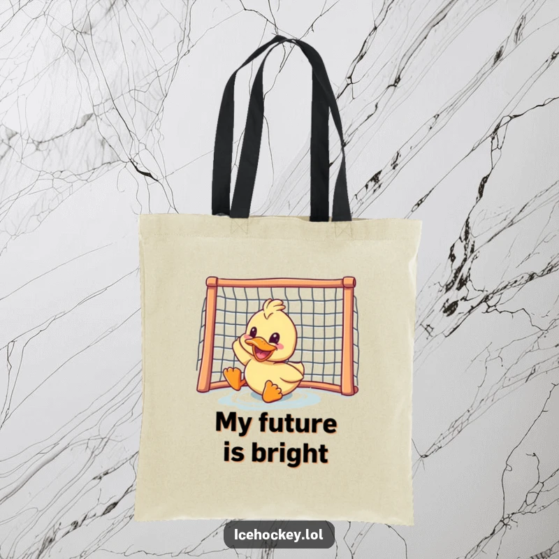 Funny duck tote bag: a delighted duck sliding with a grin towards a hockey goal, emphasizing speed, determination, and fun.