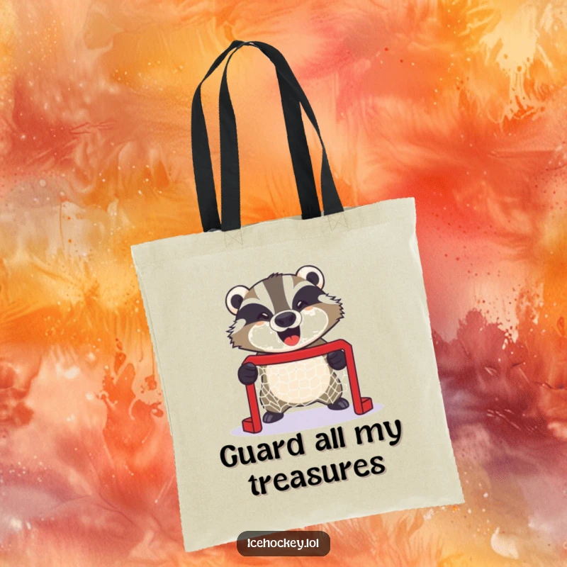 Funny tote bag of a giggling badger fiercely guarding a tiny hockey net, ready to protect its contents with a smile.