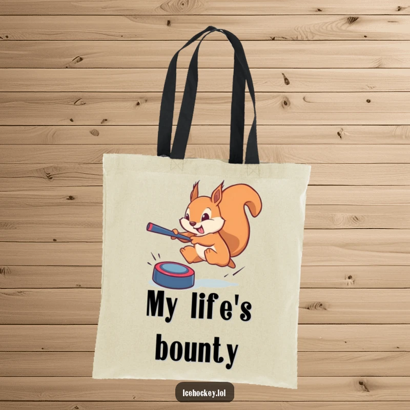 Funny squirrel tote bag: a brave squirrel leaping to block a phantom puck, showcasing determination and athletic prowess amusingly.
